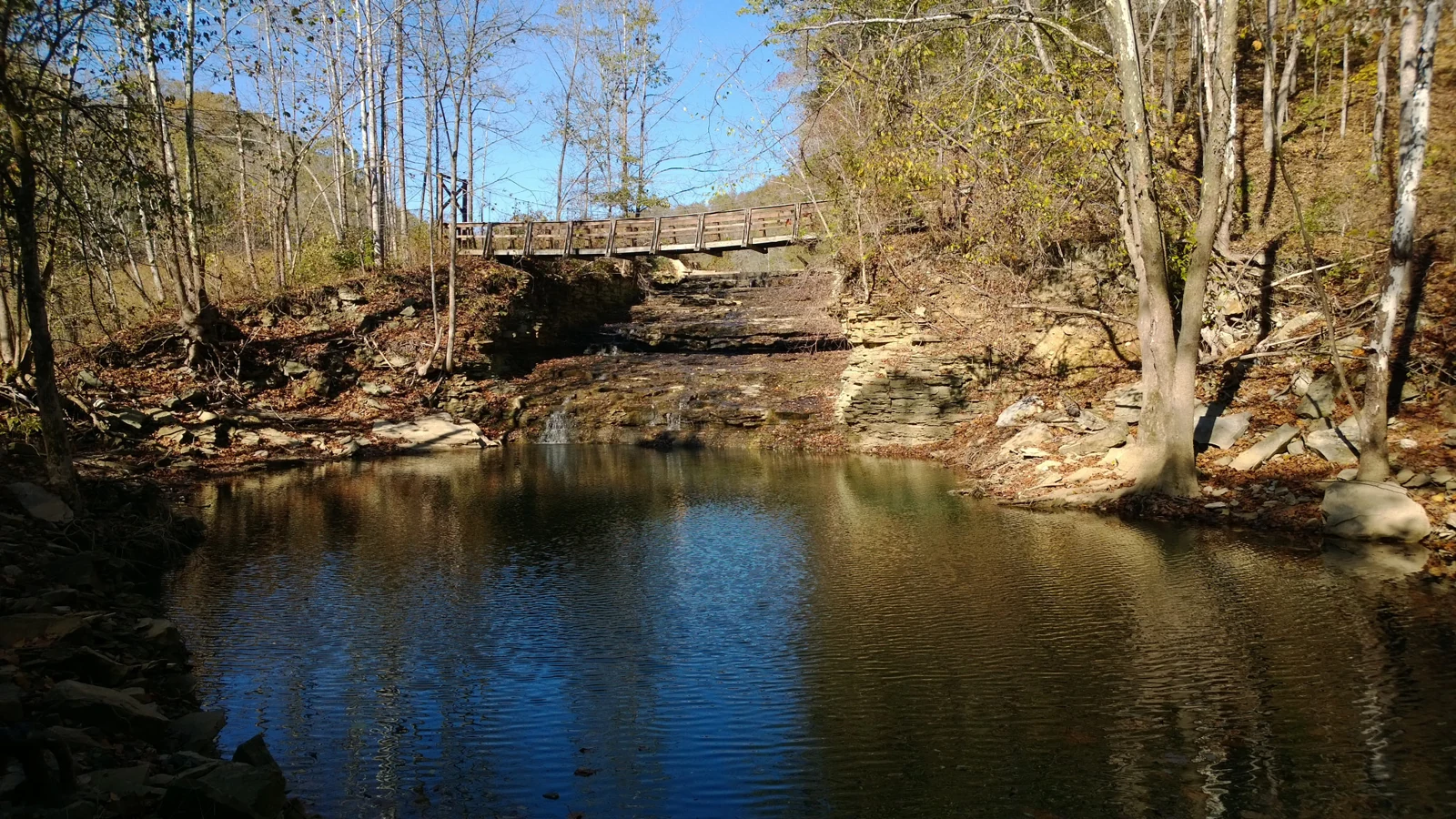 Rocky pond and footbridge in Carter Caves State Resort Park, Kentucky.