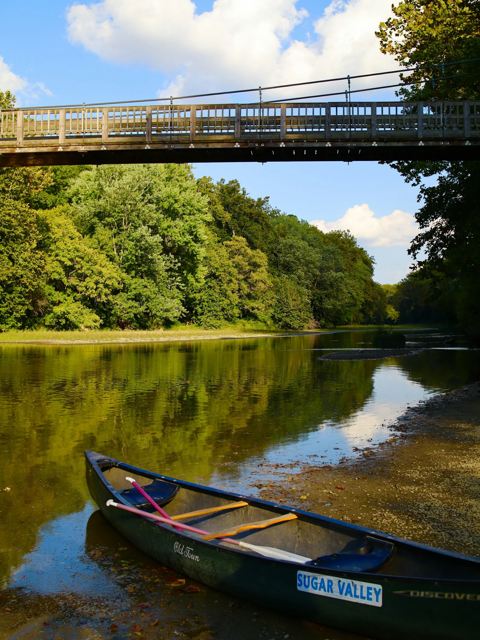 Canoe on Sugar Creek below the suspension bridge.